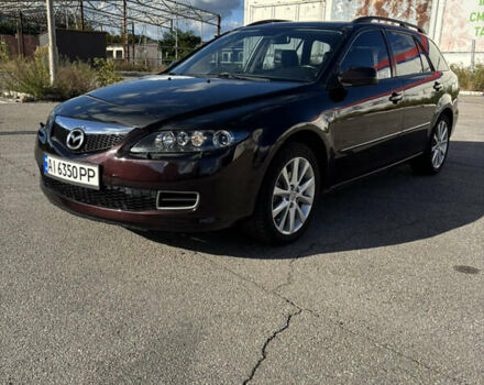 Черный Мазда 6, объемом двигателя 2.3 л и пробегом 202 тыс. км за 5250 $, фото 1 на Automoto.ua