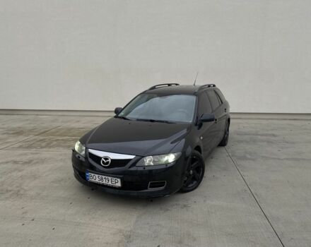 Черный Мазда 6, объемом двигателя 2 л и пробегом 345 тыс. км за 3450 $, фото 1 на Automoto.ua