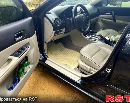 Черный Мазда 6, объемом двигателя 2 л и пробегом 289 тыс. км за 6200 $, фото 1 на Automoto.ua