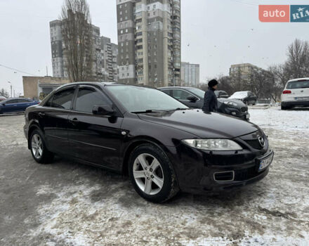Черный Мазда 6, объемом двигателя 2 л и пробегом 255 тыс. км за 5200 $, фото 1 на Automoto.ua