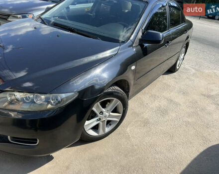 Черный Мазда 6, объемом двигателя 1.8 л и пробегом 246 тыс. км за 3850 $, фото 1 на Automoto.ua
