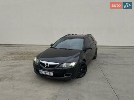Черный Мазда 6, объемом двигателя 2 л и пробегом 345 тыс. км за 3450 $, фото 1 на Automoto.ua
