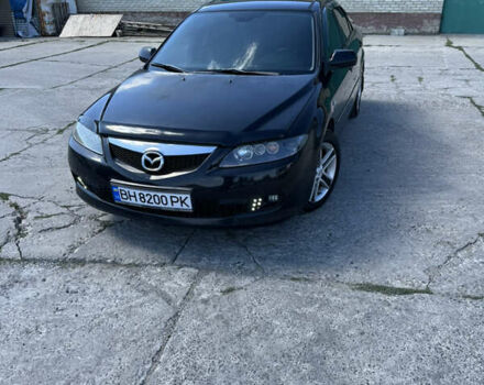 Черный Мазда 6, объемом двигателя 2 л и пробегом 235 тыс. км за 6200 $, фото 1 на Automoto.ua