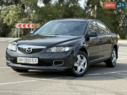 Черный Мазда 6, объемом двигателя 2.26 л и пробегом 217 тыс. км за 5100 $, фото 1 на Automoto.ua