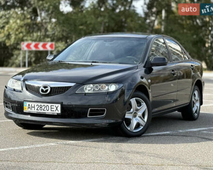 Черный Мазда 6, объемом двигателя 2.26 л и пробегом 217 тыс. км за 5100 $, фото 1 на Automoto.ua