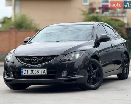 Черный Мазда 6, объемом двигателя 2 л и пробегом 300 тыс. км за 5999 $, фото 1 на Automoto.ua