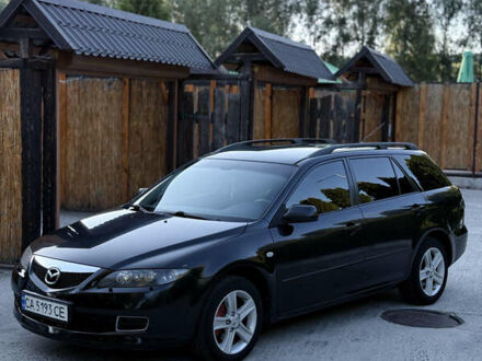 Черный Мазда 6, объемом двигателя 2 л и пробегом 326 тыс. км за 5700 $, фото 1 на Automoto.ua