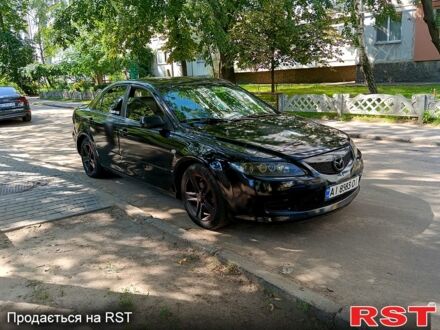 Чорний Мазда 6, об'ємом двигуна 2 л та пробігом 270 тис. км за 4499 $, фото 1 на Automoto.ua