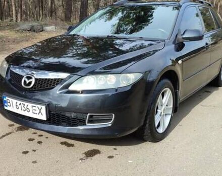 Черный Мазда 6, объемом двигателя 2 л и пробегом 264 тыс. км за 6200 $, фото 1 на Automoto.ua