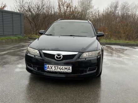 Черный Мазда 6, объемом двигателя 2 л и пробегом 140 тыс. км за 5700 $, фото 1 на Automoto.ua