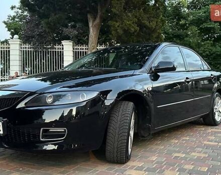 Черный Мазда 6, объемом двигателя 2 л и пробегом 180 тыс. км за 6700 $, фото 1 на Automoto.ua
