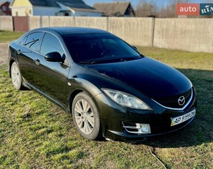 Черный Мазда 6, объемом двигателя 1.8 л и пробегом 330 тыс. км за 6200 $, фото 1 на Automoto.ua