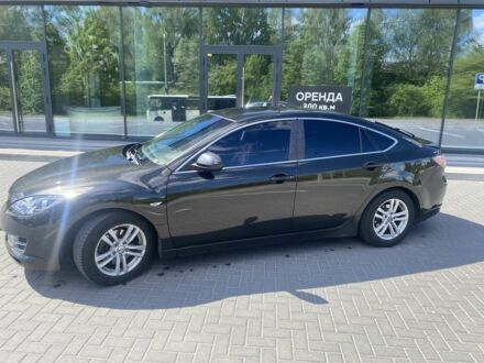 Черный Мазда 6, объемом двигателя 2 л и пробегом 344 тыс. км за 6499 $, фото 1 на Automoto.ua