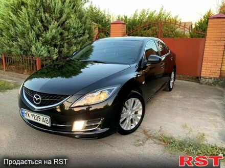Черный Мазда 6, объемом двигателя 1.8 л и пробегом 181 тыс. км за 7100 $, фото 1 на Automoto.ua