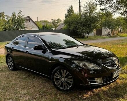 Черный Мазда 6, объемом двигателя 2 л и пробегом 99 тыс. км за 7300 $, фото 1 на Automoto.ua