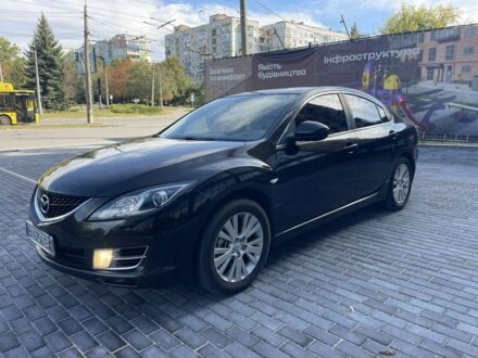 Черный Мазда 6, объемом двигателя 2 л и пробегом 265 тыс. км за 5700 $, фото 1 на Automoto.ua