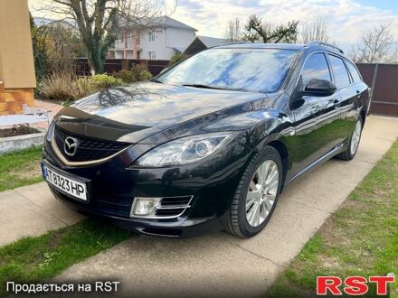 Черный Мазда 6, объемом двигателя 2 л и пробегом 318 тыс. км за 7200 $, фото 1 на Automoto.ua