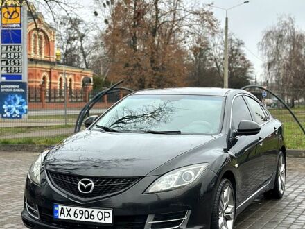 Черный Мазда 6, объемом двигателя 1.8 л и пробегом 252 тыс. км за 7000 $, фото 1 на Automoto.ua