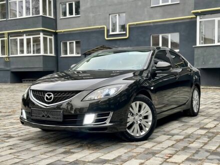 Черный Мазда 6, объемом двигателя 2 л и пробегом 253 тыс. км за 6500 $, фото 1 на Automoto.ua