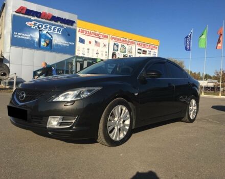 Черный Мазда 6, объемом двигателя 2 л и пробегом 139 тыс. км за 10499 $, фото 1 на Automoto.ua