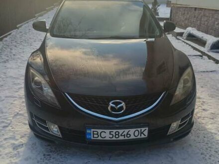 Черный Мазда 6, объемом двигателя 2 л и пробегом 241 тыс. км за 7000 $, фото 1 на Automoto.ua