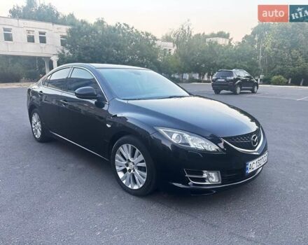 Черный Мазда 6, объемом двигателя 2 л и пробегом 239 тыс. км за 7000 $, фото 1 на Automoto.ua