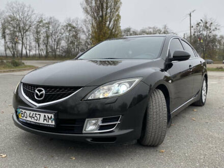 Черный Мазда 6, объемом двигателя 2 л и пробегом 246 тыс. км за 10000 $, фото 1 на Automoto.ua