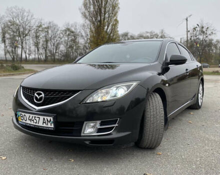 Черный Мазда 6, объемом двигателя 2 л и пробегом 246 тыс. км за 10000 $, фото 1 на Automoto.ua