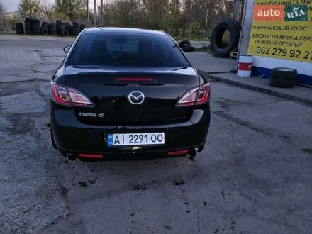 Черный Мазда 6, объемом двигателя 2 л и пробегом 300 тыс. км за 6200 $, фото 1 на Automoto.ua