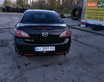 Черный Мазда 6, объемом двигателя 2 л и пробегом 300 тыс. км за 6200 $, фото 1 на Automoto.ua