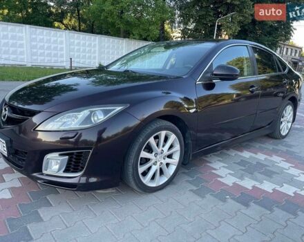 Черный Мазда 6, объемом двигателя 2 л и пробегом 237 тыс. км за 5600 $, фото 1 на Automoto.ua