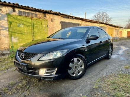 Черный Мазда 6, объемом двигателя 2.4 л и пробегом 234 тыс. км за 3699 $, фото 1 на Automoto.ua