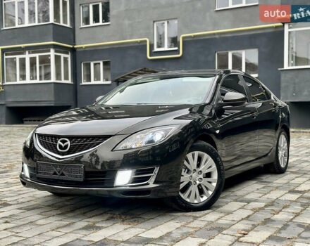 Черный Мазда 6, объемом двигателя 2 л и пробегом 253 тыс. км за 6500 $, фото 1 на Automoto.ua