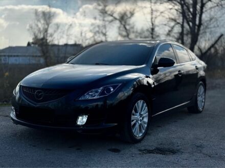 Черный Мазда 6, объемом двигателя 2 л и пробегом 199 тыс. км за 6500 $, фото 1 на Automoto.ua