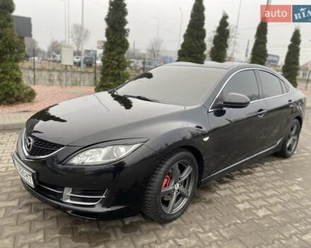 Черный Мазда 6, объемом двигателя 2 л и пробегом 210 тыс. км за 7500 $, фото 1 на Automoto.ua