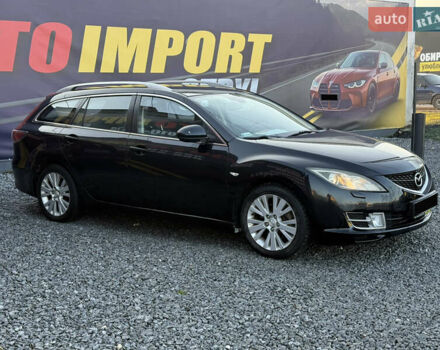 Черный Мазда 6, объемом двигателя 2 л и пробегом 331 тыс. км за 5800 $, фото 1 на Automoto.ua