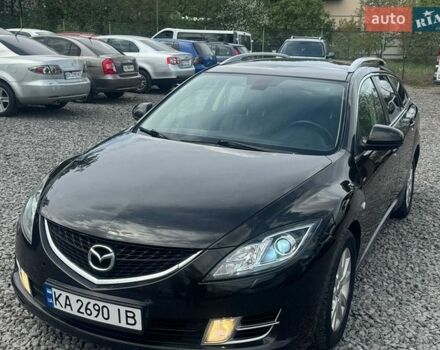 Черный Мазда 6, объемом двигателя 2 л и пробегом 304 тыс. км за 5999 $, фото 1 на Automoto.ua