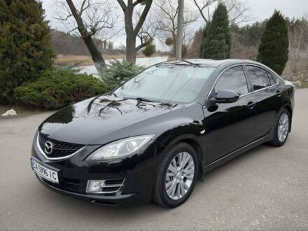 Черный Мазда 6, объемом двигателя 2 л и пробегом 258 тыс. км за 6890 $, фото 1 на Automoto.ua