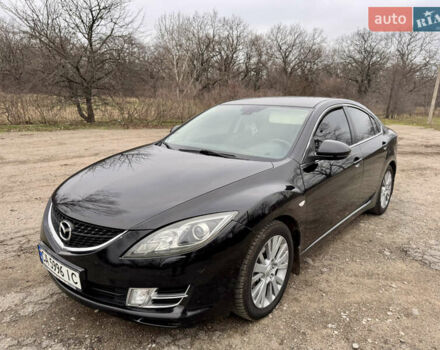 Черный Мазда 6, объемом двигателя 2 л и пробегом 258 тыс. км за 6900 $, фото 1 на Automoto.ua