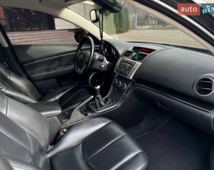 Черный Мазда 6, объемом двигателя 2.5 л и пробегом 210 тыс. км за 9499 $, фото 1 на Automoto.ua