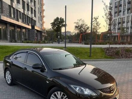 Черный Мазда 6, объемом двигателя 2 л и пробегом 248 тыс. км за 8899 $, фото 1 на Automoto.ua