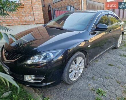 Черный Мазда 6, объемом двигателя 2 л и пробегом 114 тыс. км за 7400 $, фото 1 на Automoto.ua