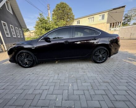 Черный Мазда 6, объемом двигателя 2 л и пробегом 240 тыс. км за 6499 $, фото 1 на Automoto.ua