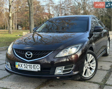 Черный Мазда 6, объемом двигателя 2 л и пробегом 146 тыс. км за 7250 $, фото 1 на Automoto.ua