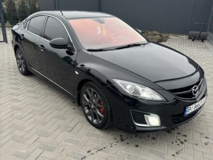 Черный Мазда 6, объемом двигателя 2.5 л и пробегом 303 тыс. км за 7100 $, фото 1 на Automoto.ua