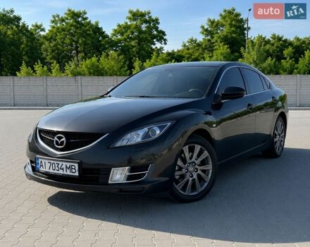 Чорний Мазда 6, об'ємом двигуна 2 л та пробігом 266 тис. км за 7599 $, фото 1 на Automoto.ua