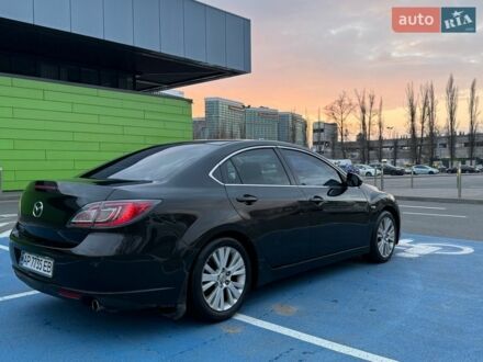 Черный Мазда 6, объемом двигателя 2 л и пробегом 247 тыс. км за 6100 $, фото 1 на Automoto.ua