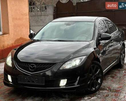 Черный Мазда 6, объемом двигателя 2.5 л и пробегом 259 тыс. км за 6200 $, фото 1 на Automoto.ua