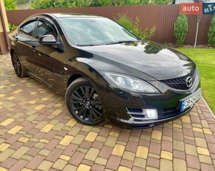 Черный Мазда 6, объемом двигателя 2 л и пробегом 215 тыс. км за 6950 $, фото 1 на Automoto.ua