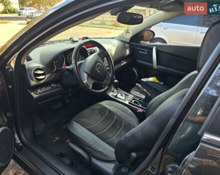 Черный Мазда 6, объемом двигателя 2 л и пробегом 220 тыс. км за 8200 $, фото 1 на Automoto.ua